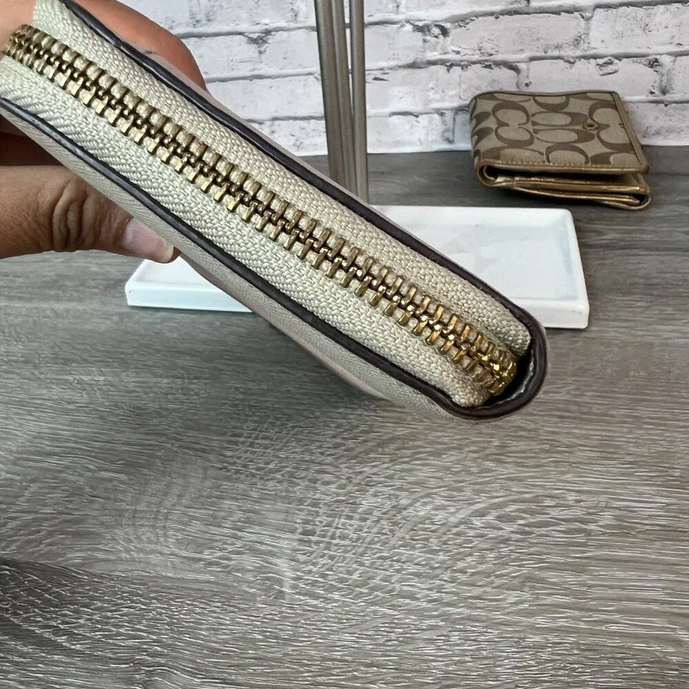 Kate sapde Accordion zip around wallet clutch
